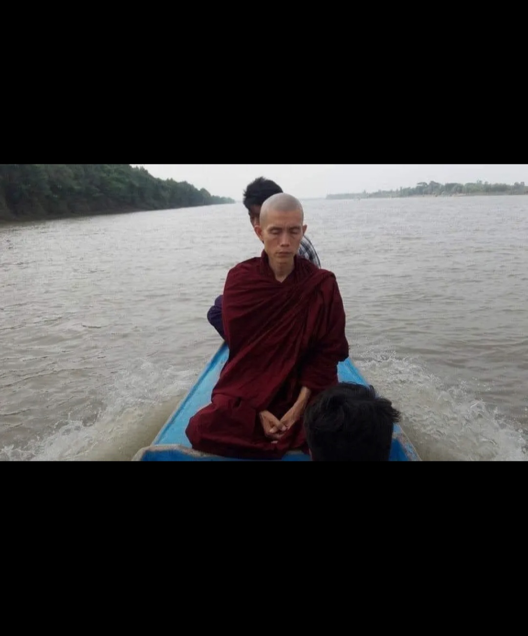 Sayadaw Ashin Ottamathara travelling by boat.